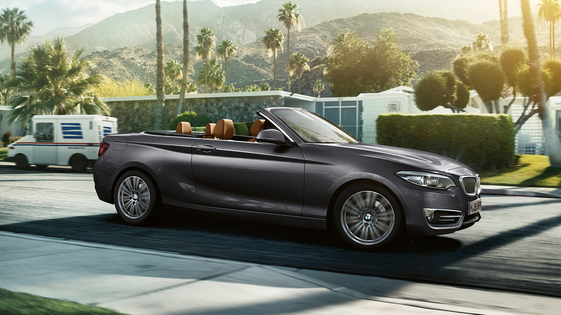 BMW 2. seeria Cabrio, pilt küljelt sõitmise ajal BMW 2. seeria Cabrio, pilt küljelt sõitmise ajal