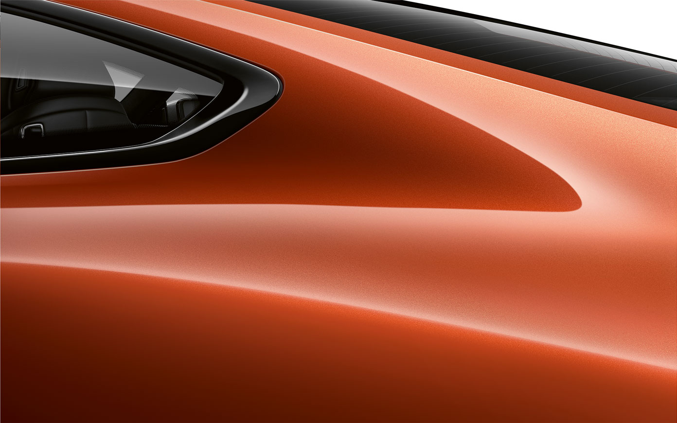 BMW 8. seeria Coupé C-piilari lähivõte. BMW 8. seeria Coupé Sunset Orange metalliktoonis C-piilari lähivõte.