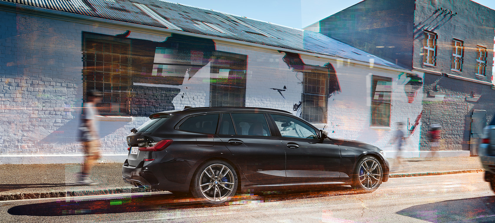 BMW M340i xDrive Touring, külgvaade BMW M340i xDrive Touring G21 Black Sapphire metallik, külgvaade tänaval