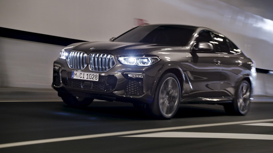 BMW X6 G06 2019, kolm neljandikku eestvaade BMW X6 G06 2019, kolm neljandikku eestvaade, sõitmas linnas