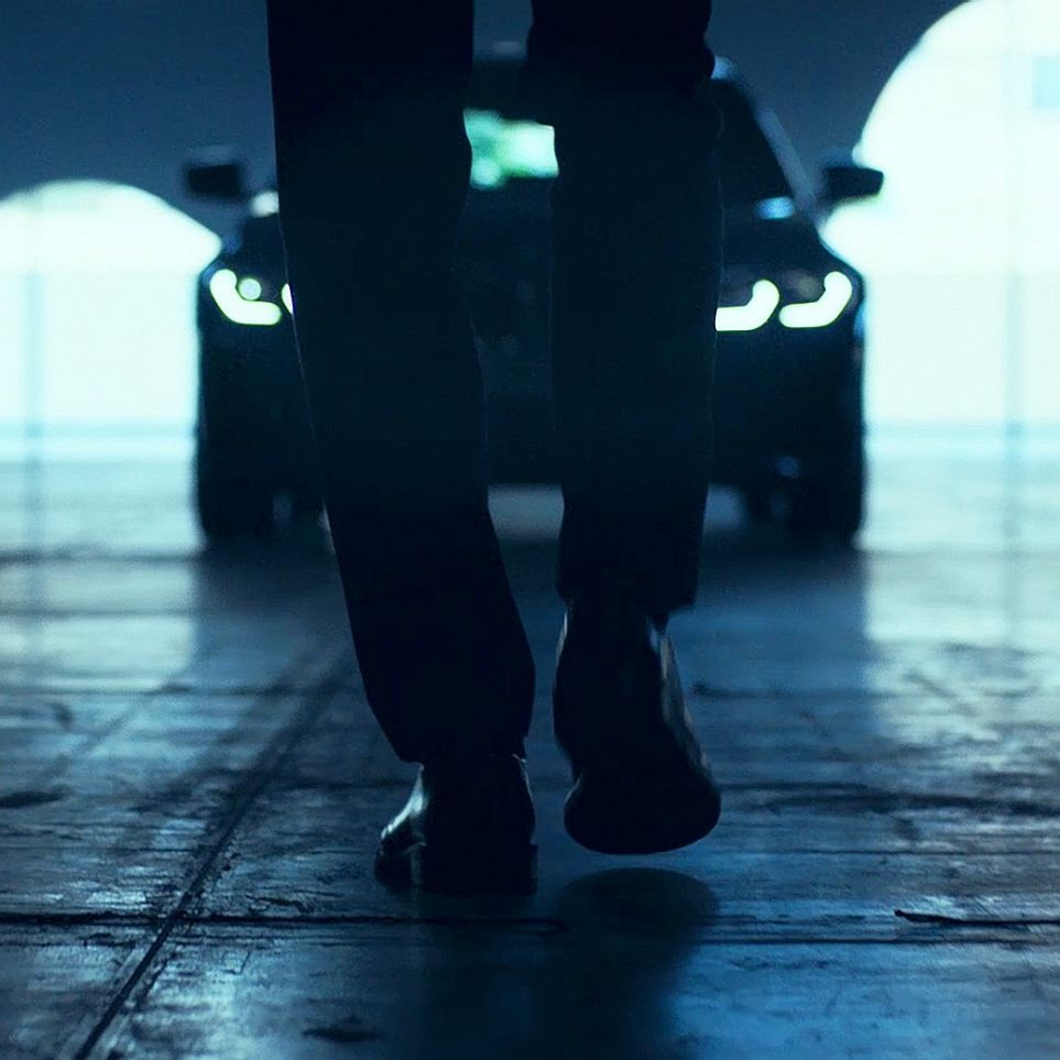 BMW 3 Series Sedan, Front. Man in front of the BMW 3 Series Sedan.